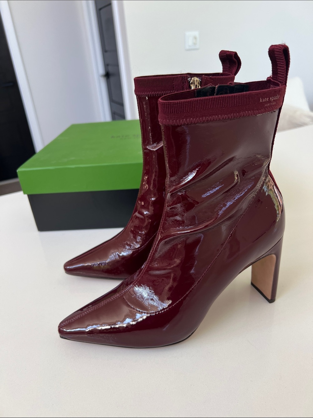 Kate Spade down under stretch patent cordovan dark red pointed toe booties ankle
